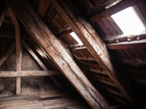 Old attic space interior with poor roof ventilation