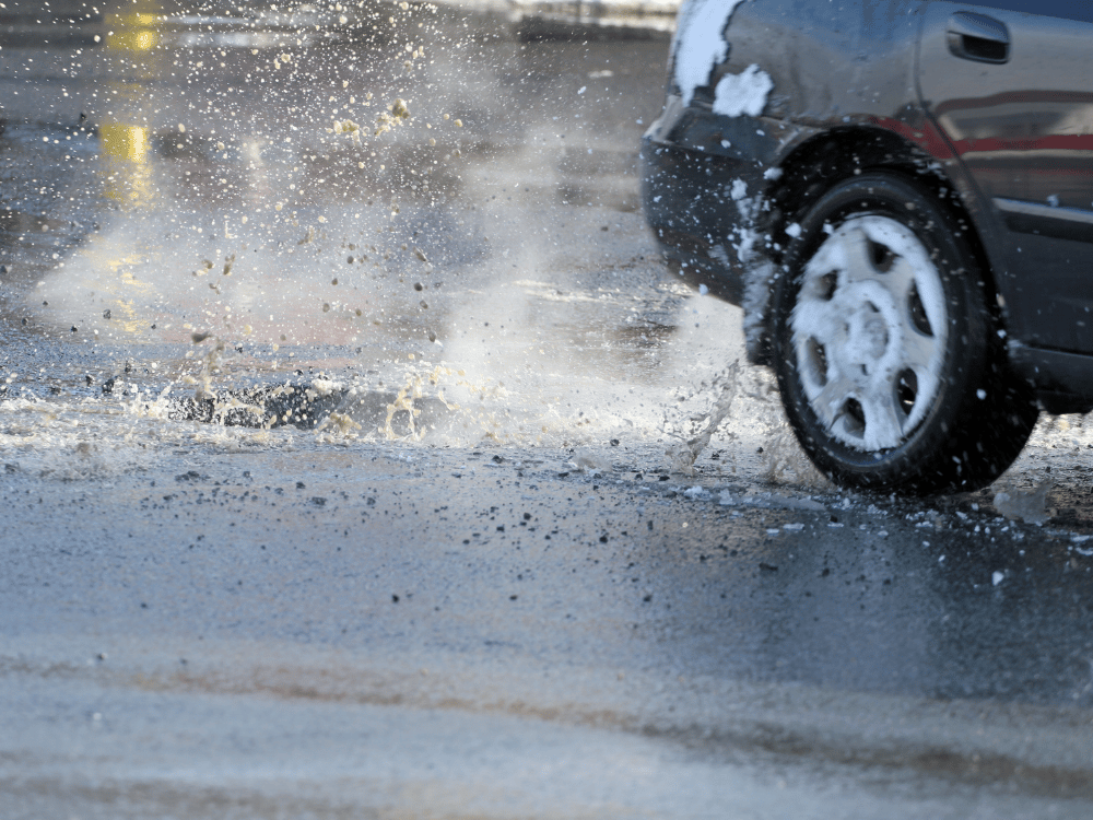 Brutal winter weather damages your roofing system - parallel to potholes damaging your car