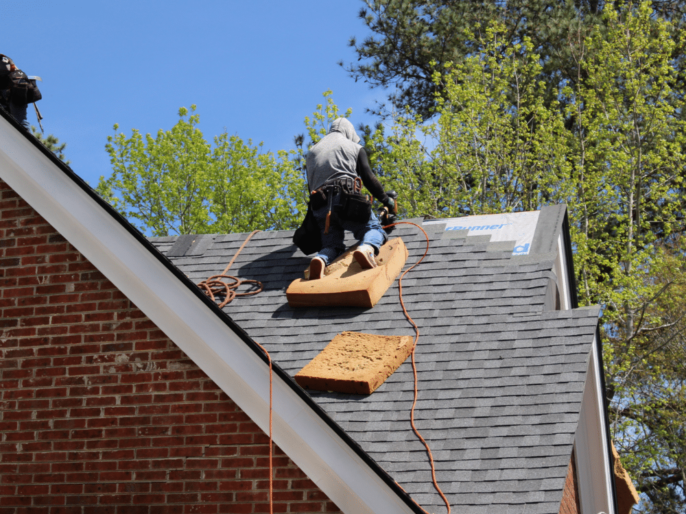 Asphalt roofing shingles being installed correctly