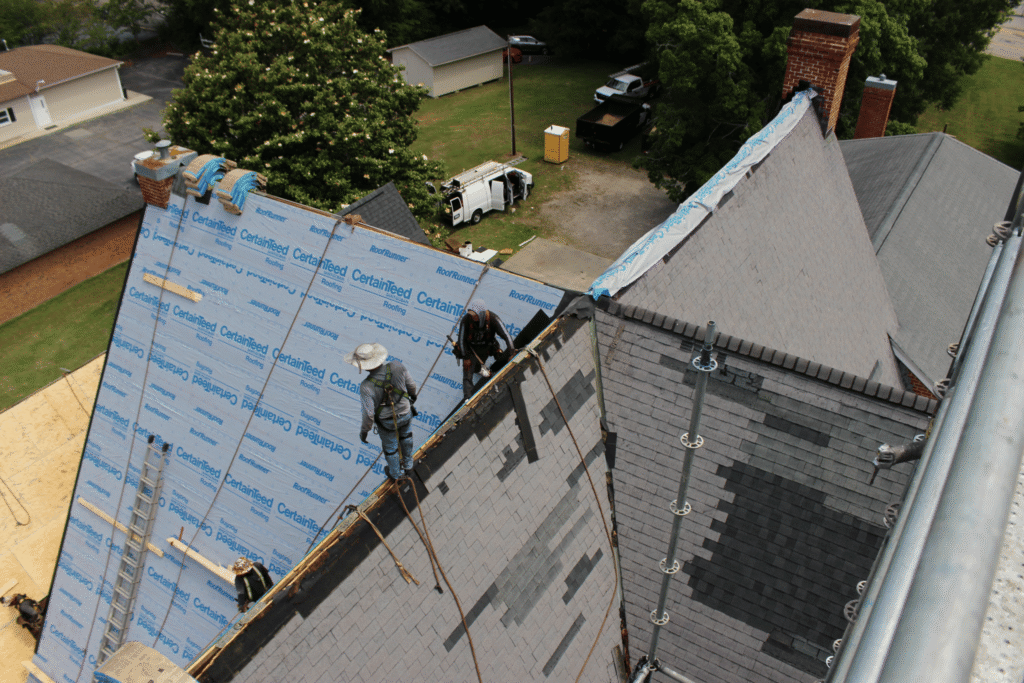 Church roof replacement view from scaffolding - Artisan Quality Roofing Church roof replacement view from scaffolding