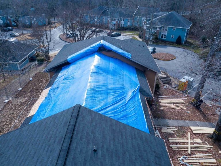 roof-tarping-services-1-1-768x576 - Artisan Quality Roofing Tarp for leaky roof. Durham Homeowner.