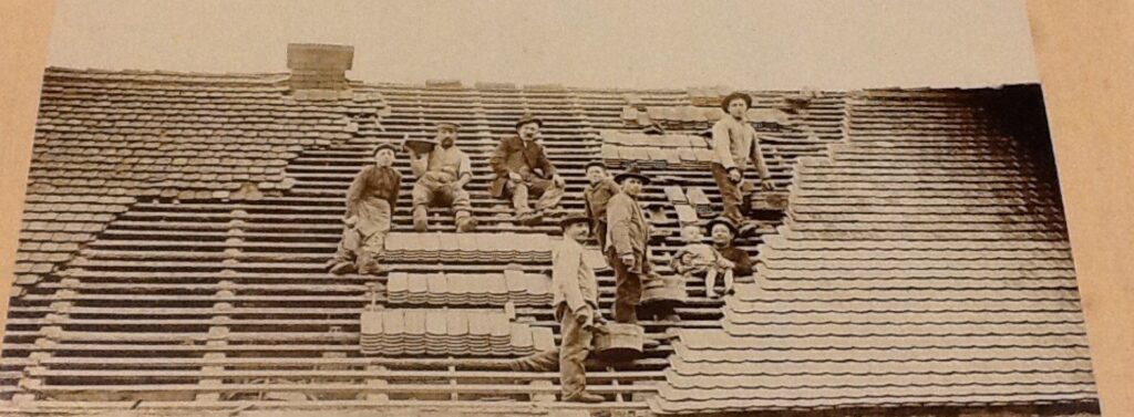 1890s roofers - Artisan Quality Roofing Roofing crew on a roof in the 1800's