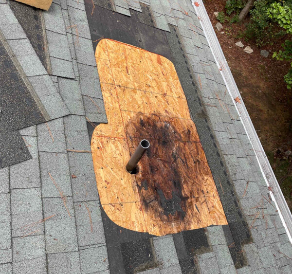 Top Signs for need a roof repair. Roof decking and shingles need to be replaced.